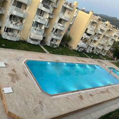 Güzelçamli, Kusadasi Apartment with a pool