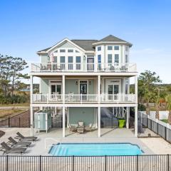 Coastal Charm Ocean Isle Beach custom beach home with 4 bedroom, 3 bath home with pool and elevator
