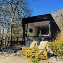 Dog friendly cabin with hot tub and views of Cairngorms