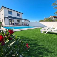 Holiday house with a swimming pool Fratrici, Umag - 22401
