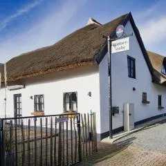 nah am Meer, ruhige Lage, gratis Nutzung vom AHOI Erlebnisbad und Sauna in Sellin - Haus Büdnerstube FeWo 5