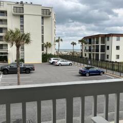 Ocean-view townhome with balcony & W/D - walk to beach - dog-friendly