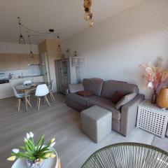 Gelijkvloers vakantie-appartement met groot zonnig terras