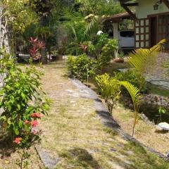 Casa Muro de Pedra / Cabrália