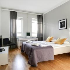 Kotimaailma Apartments Kamppi - Tilava, 2 makuuhuonetta - Rauhallinen, valoisa & täysin varusteltu