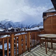 Studio plein sud avec terrasse vue sur la Muzelle situé en plein cœur des 2 alpes.