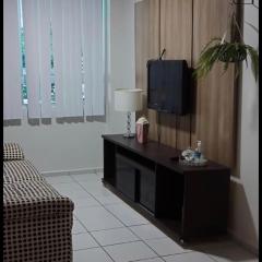 Apto para até 4 pessoas,com Wi-Fi,ótima localização, área de lazer com conveniência e piscina para criança