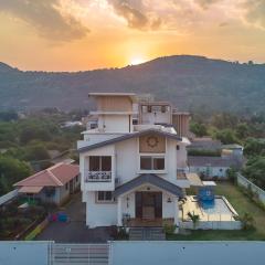 StayVista's Kaarma Villa - Valley-View Villa with Outdoor Pool, Lawn featuring a Gazebo & Machan