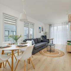 Cosy and Bright Apartment in Dźwirzyno with Furnished Balcony and Free Parking by Noclegi Renters