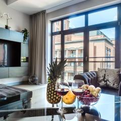 Lumina Loft Tymienieckiego with a view of the lake