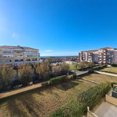 Close to the port and the beach!