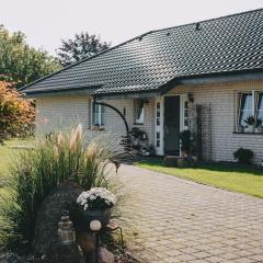 Bungalow mit Basketballplatz