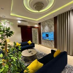 شقة فاخرة غرفة وصالة النرجس ١٨