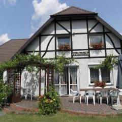 Ferienhaus in Pluski mit Grill, Terrasse und Garten