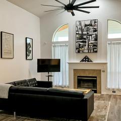 Waterfront 2-story home with water views, patio, streaming, washer/dryer, & AC