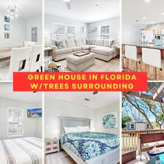 Green House in Florida with Trees Surrounding