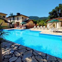 Casa de condomínio 900m da Praia de Boiçucanga