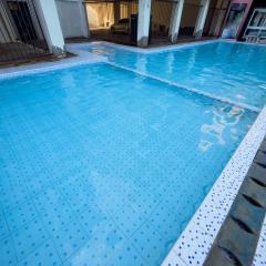 BEACHVIEW FURNISHED APARTMENTS WITH SWIMMING POOL