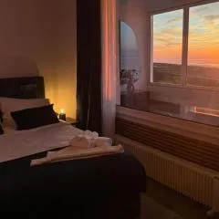 CuxHeaven - modernes Studio-Apartment direkt am Meer mit Pool, Sauna und Massage