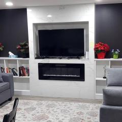 Cozy 2-Bedroom Basement Guest Suite with Private Entrance and Proximity to the Airport