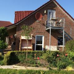 Ferienwohnung zwischen Meer und Moor mit Panoramablick über einer Galerie