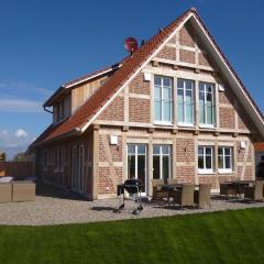 Gemütliches Ferienhaus in Groß Schwansee mit Terrasse, Garten und Grill