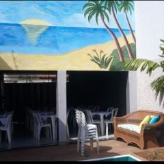 Casa mobiliada para periodo TECNOSHOW 3 quartos sendo 1 suíte todos com ar condicionado sala copa cozinha lavanderia área de lazer com piscina e bar molhado com.churrasqueiras cozinha montada