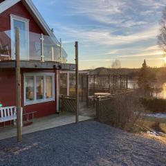 Gemütliches Ferienhaus in Kåtebol mit Grill und Terrasse und Seeblick