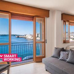 Una Finestra Su Cala Rossa by Wonderful Italy