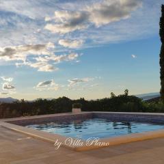 Ferienhaus in Plano mit Offenem Kamin und Meerblick