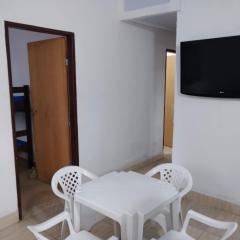 Casa 2 quartos e sala com cozinha e banheiro de FRENTE pro RIO em Caraguagautatuba Porto Novo 900 metros da Praia