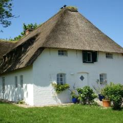 Thatched roof house Poppenbüll
