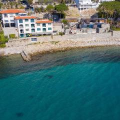 Incantevole alloggio pieds dans l'eau