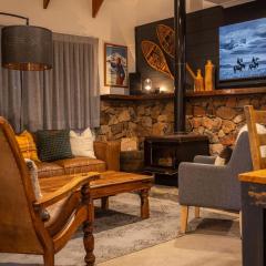 Crackenback Castle free standing chalet with fire place