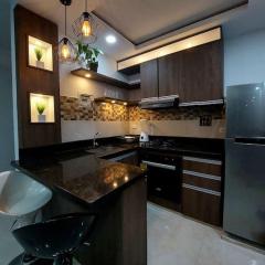 Apartamento en condominio con piscina