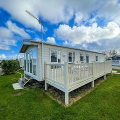 Beautiful Caravan With Decking At California Cliffs In Scratby Ref 50052l