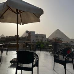 Malak pyramids inn
