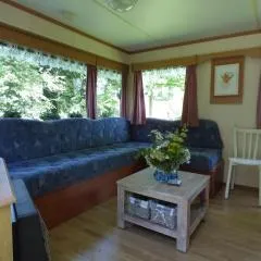 Well-equipped mobile home with garden in Normandy