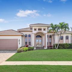 Beachy west exposure waterfront home with pool and spa