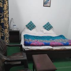 Bageshwar Dham Shivam Lodge