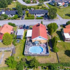 Amazing Home In Vstervik With Heated Swimming Pool