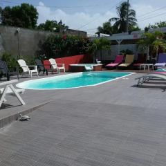 Appartement de 2 chambres avec piscine partagee jardin clos et wifi a Sainte Anne a 1 km de la plage