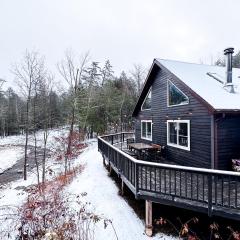 Serene Retreat on a Stream