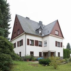 Holiday homes for two people with a swimming pool in the Ore Mountains