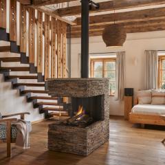 Am Wildbachberg - Luxus Ferienhäuser mit Infinitypool, Privatsauna und Weinkeller