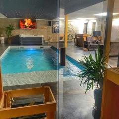 Loft moderne avec piscine privée jacuzzi sauna hammam
