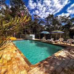 Casa de campo com churrasq e piscina em Embura SP