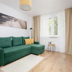 Cozy Apartment near Royal Baths Park by Noclegi Renters
