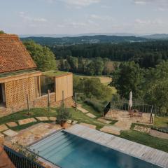 Am Wildbachberg - Luxus Ferienhäuser mit Infinitypool, Privatsauna und Weinkeller