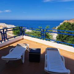 Apartment in Taurito with dream landscape and 30m2 terrace.
